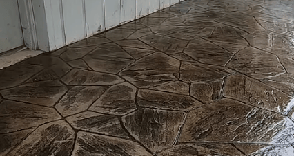 A polished concrete patio area that is finished and shining.  It has just been coated and sealed.