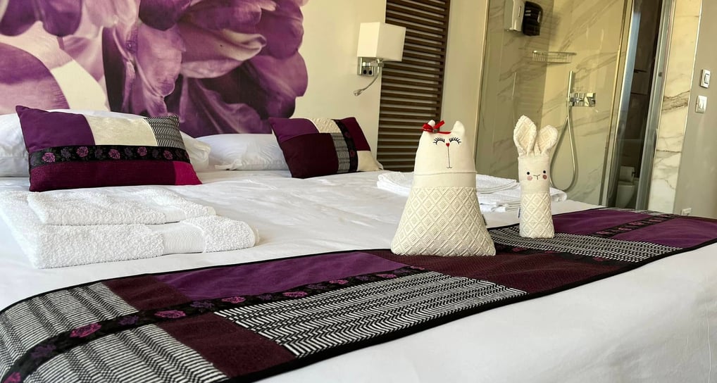 a bed with towels and towels on it