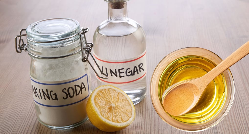 a bottle of vinegar and baking soda and cooking oil