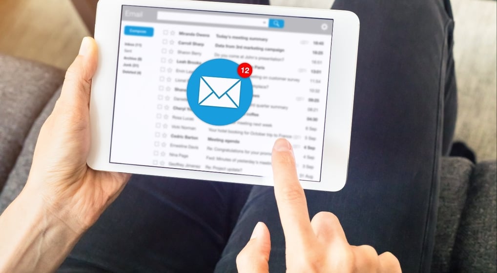 a person holding a tablet with a mailbox on it-Digital marketing Course