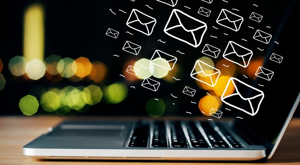 a laptop computer with a lot of mailboxes coming out of it-Digital marketing Course
