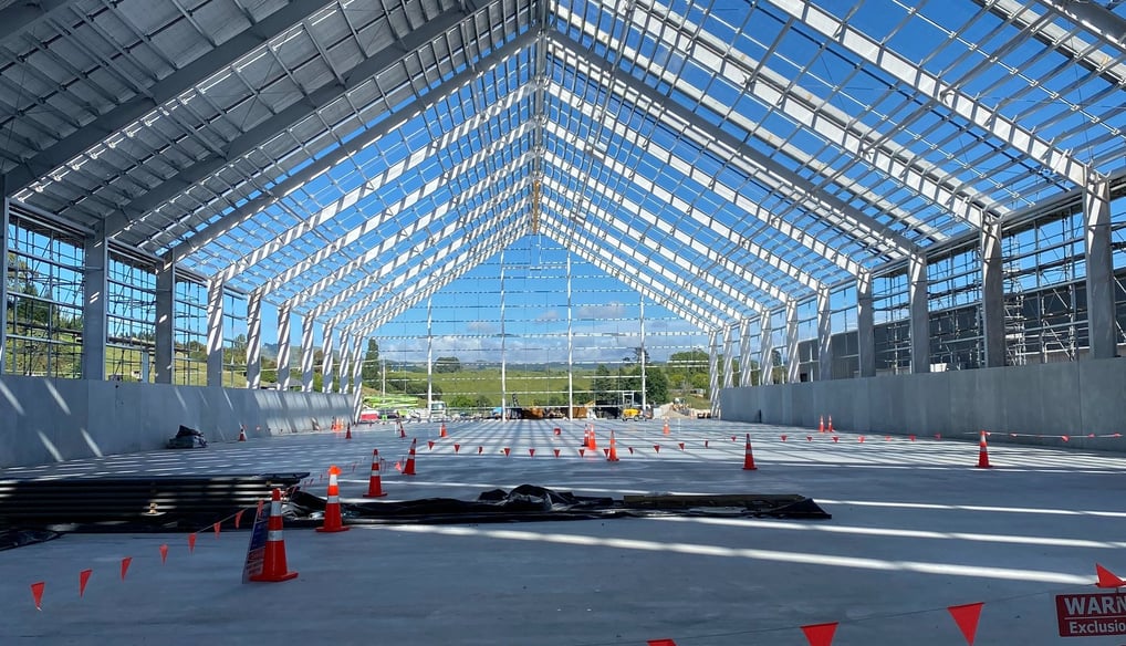 a large open airy structure with a lot of orange cones