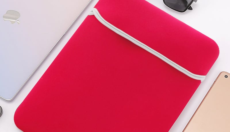 a laptop case with a pen and a pen