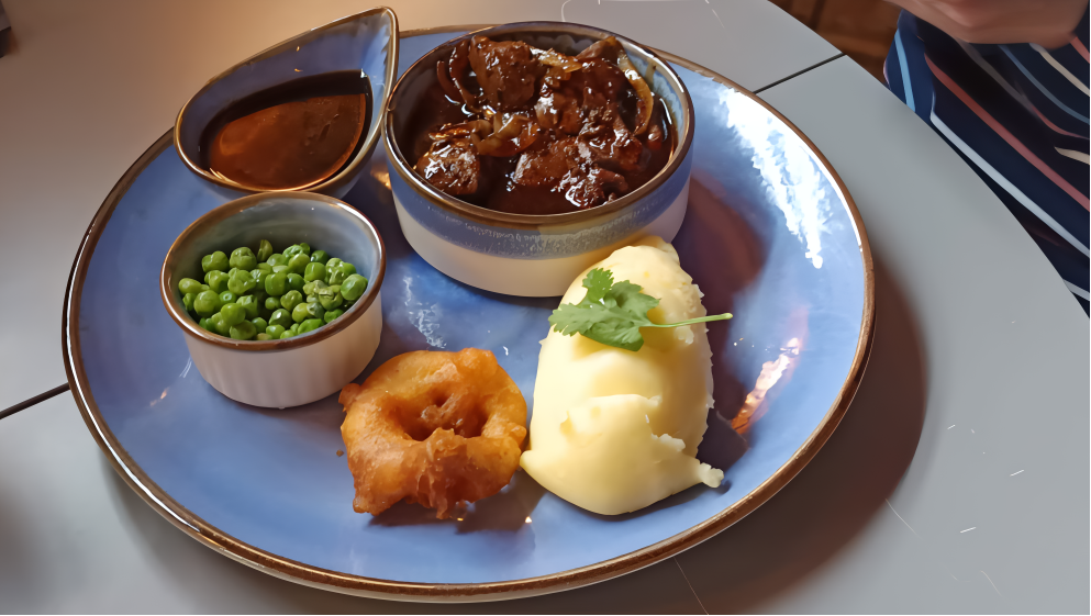 a plate with a bowl of food and a bowl of food