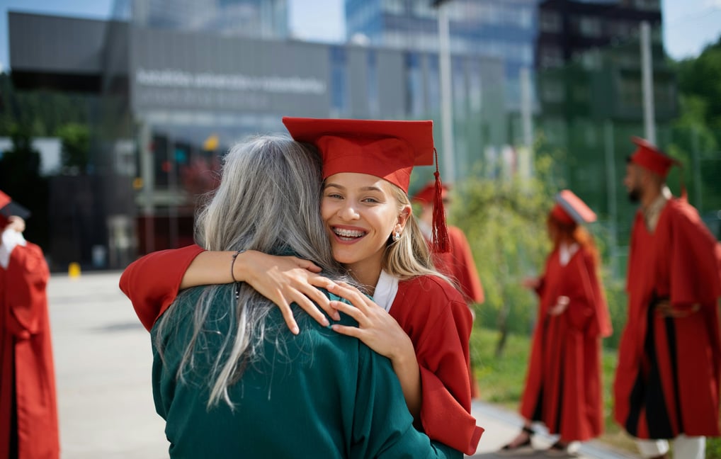 A happy students and a parent that are graduating because they used chimhanda tutoring's cambridge maths online tutoring 