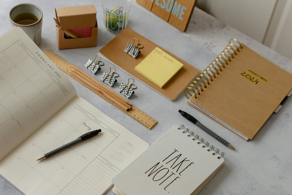 An image with stationary on a desk used to show the benefits of a study system