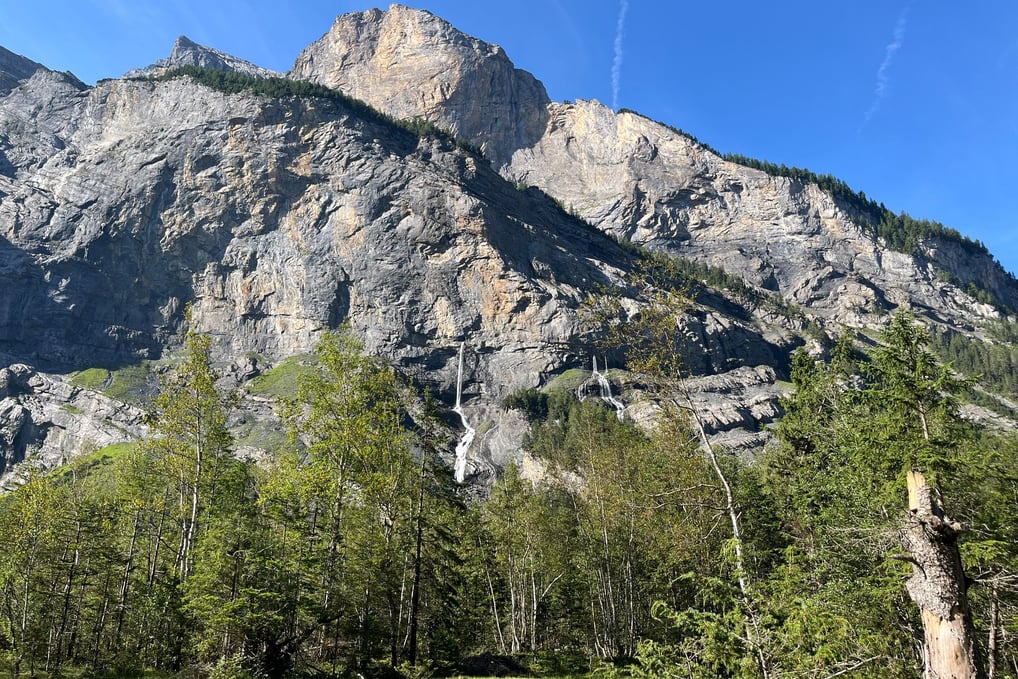 Waterfalls appearing out of the walls of the Gasterntal