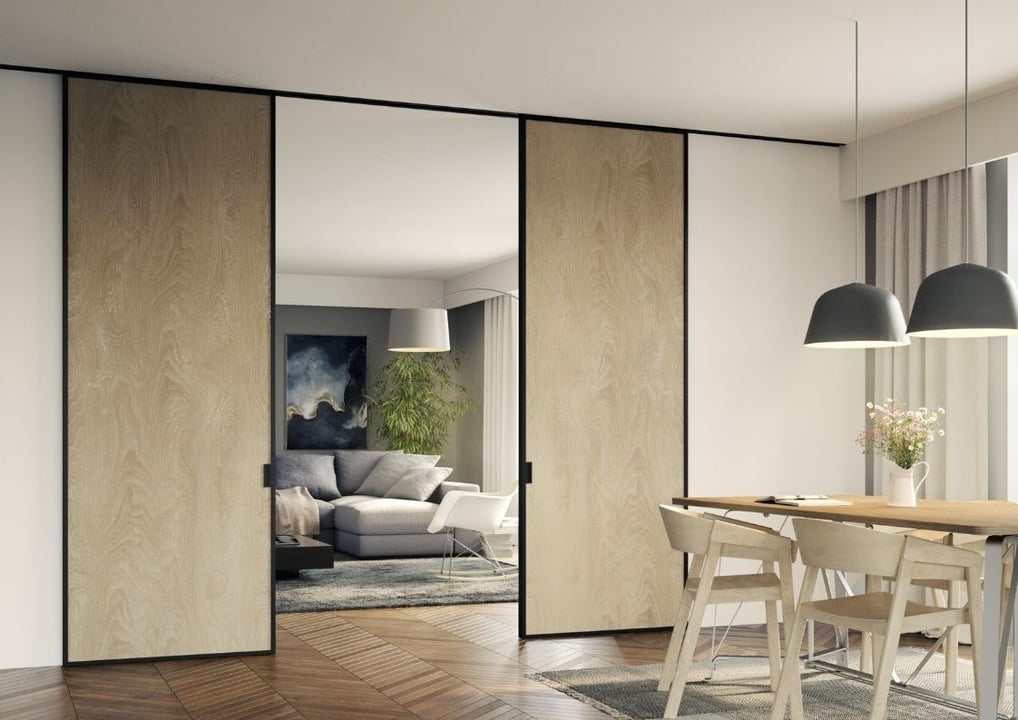 Paneles correderos para separar ambientes en espacios con madera natural y diseño contemporáneo