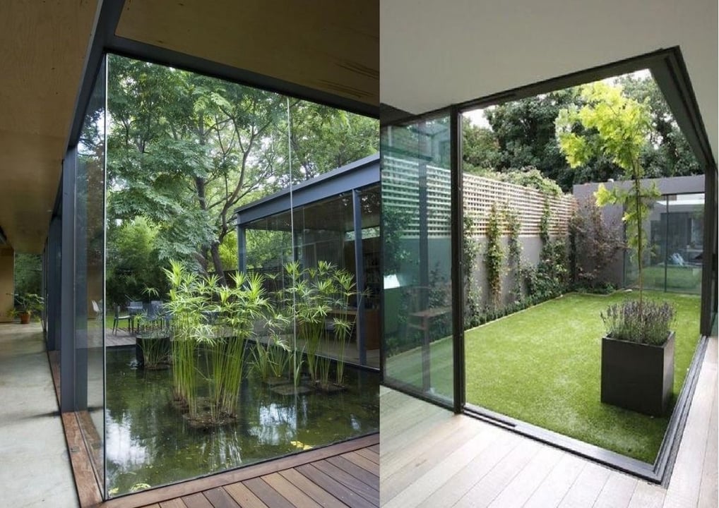 Patio interior con estructura acristalada y jardín integrado en arquitectura sostenible