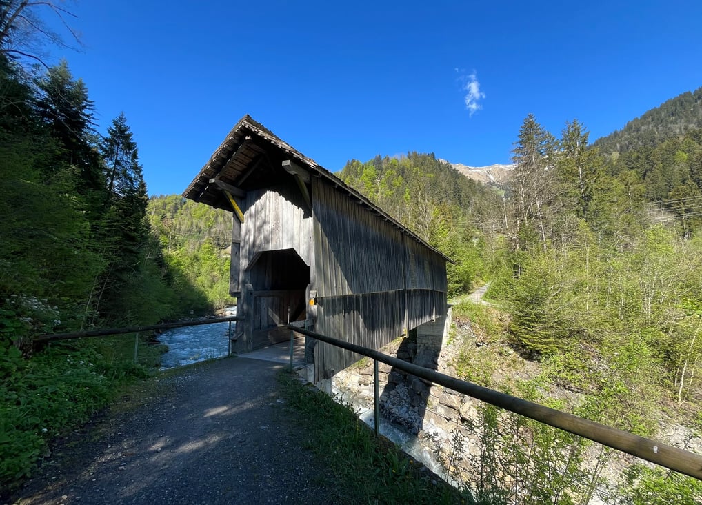 A covered bridge over the Entschlige River outside of Frutigen