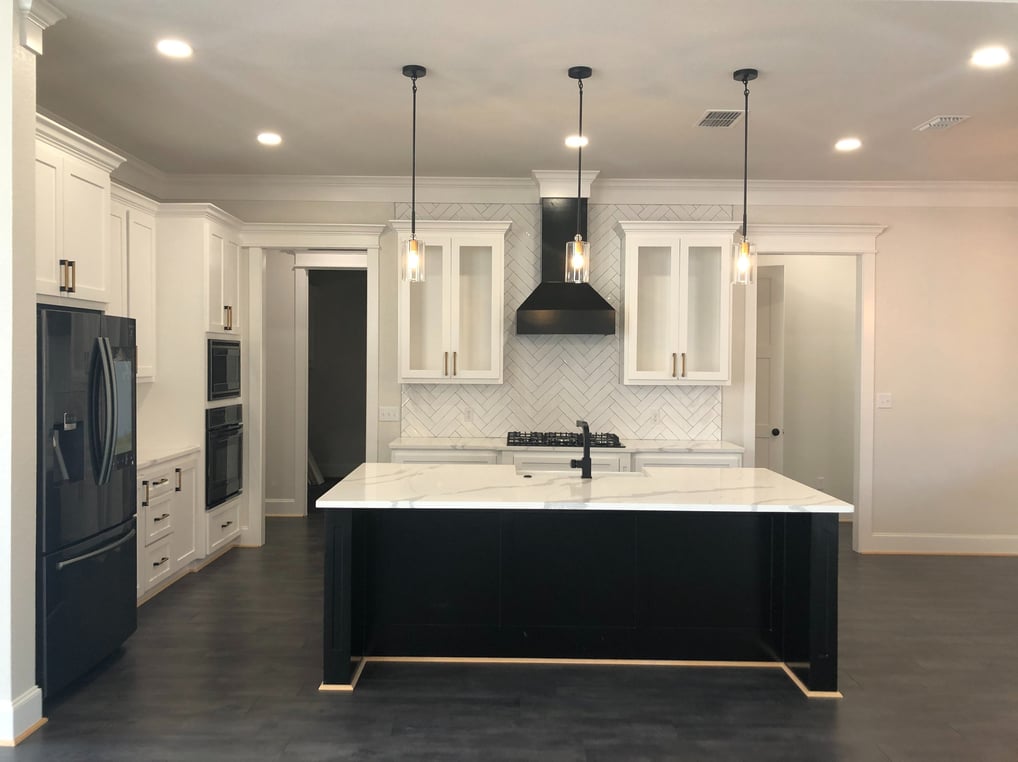 beautiful black and white modern kitchen designed by Dews Custom Homes