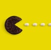 analogia de diseño sobre Pac man de oreo comiendo caramelos