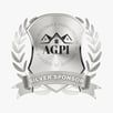 a silver plated badge with a silver ribbon around it
