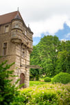 a large castle like building with a tower