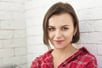 femme de 30 ans qui sourit