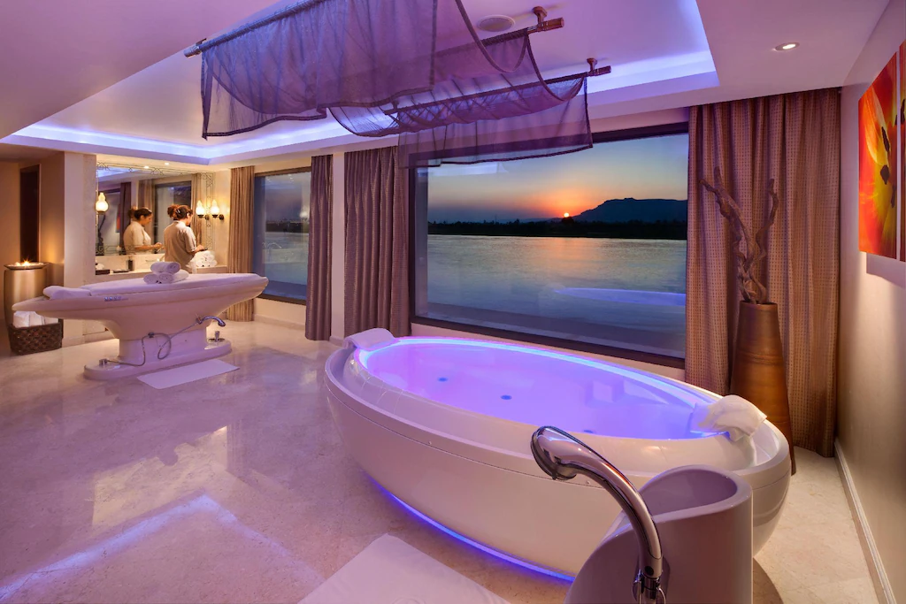 Hilton Luxor Resort spa with a modern hydrotherapy tub and river sunset views