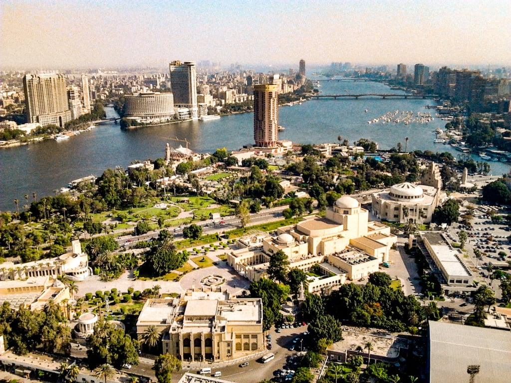 Aerial view of the Cairo Opera House and Gezira Island skyline overlooking the Nile River in Egypt.