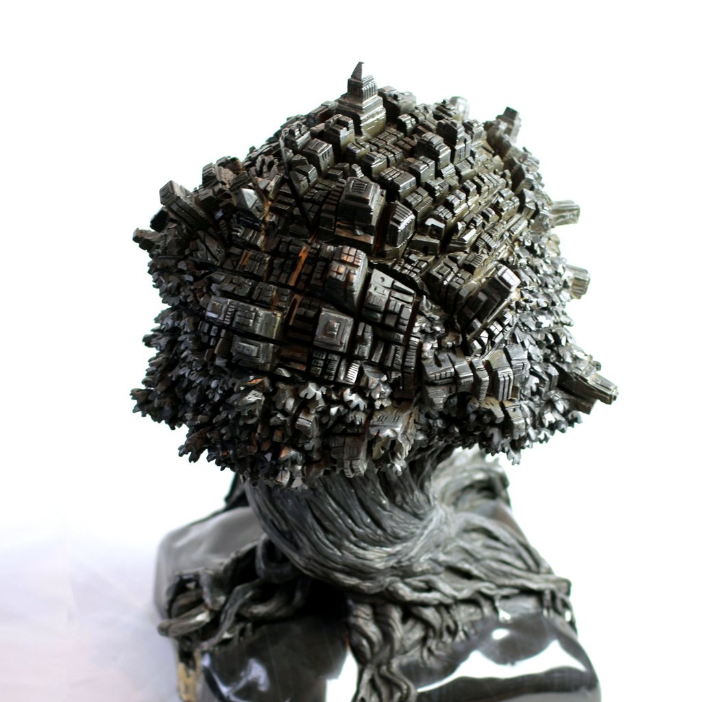"La cité", sculpture en marbre noir de Golzinne du sculpteur français "Herrel"