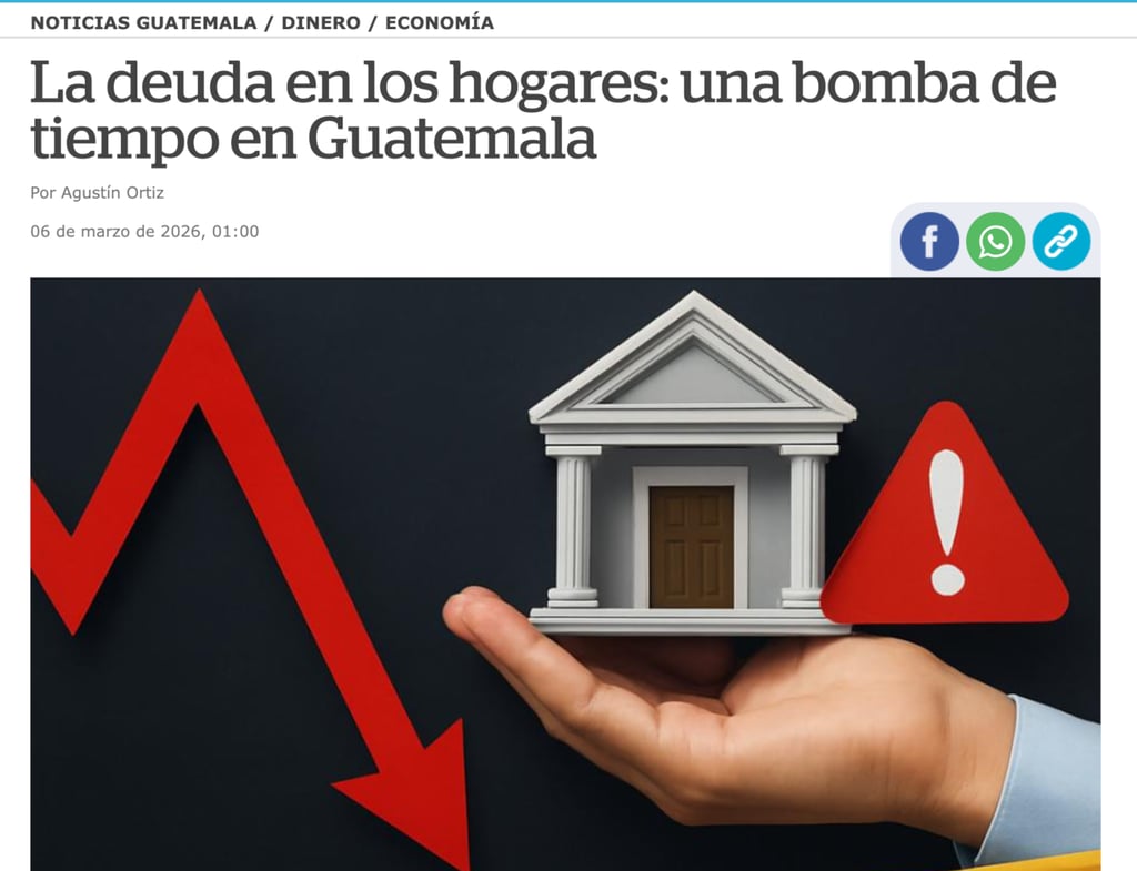 Hand holding a model house next to a red warning sign and a falling economic arrow.