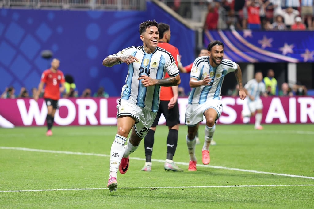 Enzo Fernandez celebrates a goal for Argentina national football team in a stadium match.