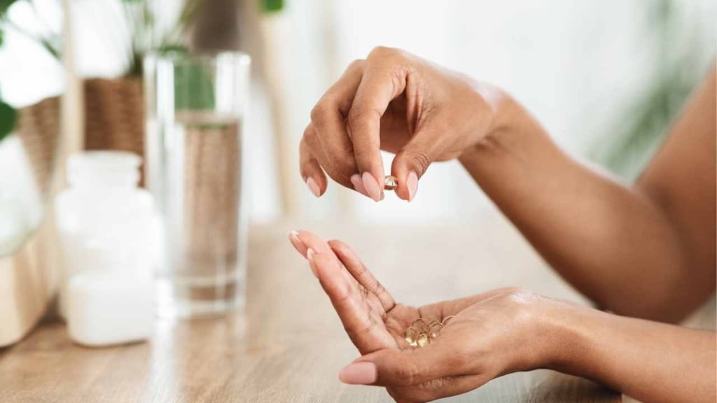 woman preparing daily supplements healthy morning routine over 35 wellness