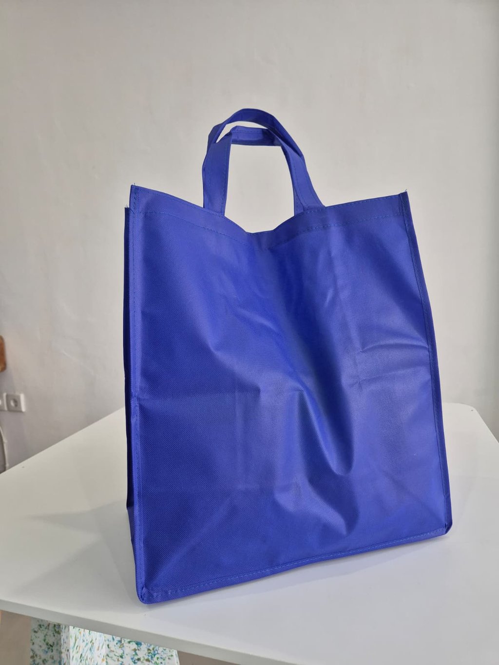 “Recyclable laundry bag used at Bali Laundry Lab, symbolizing plastic‑free and eco‑friendly washing.