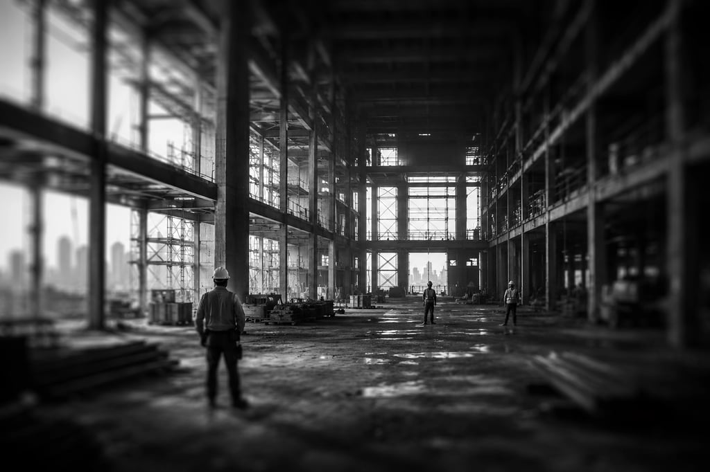 building under construction, but wirh very few workers