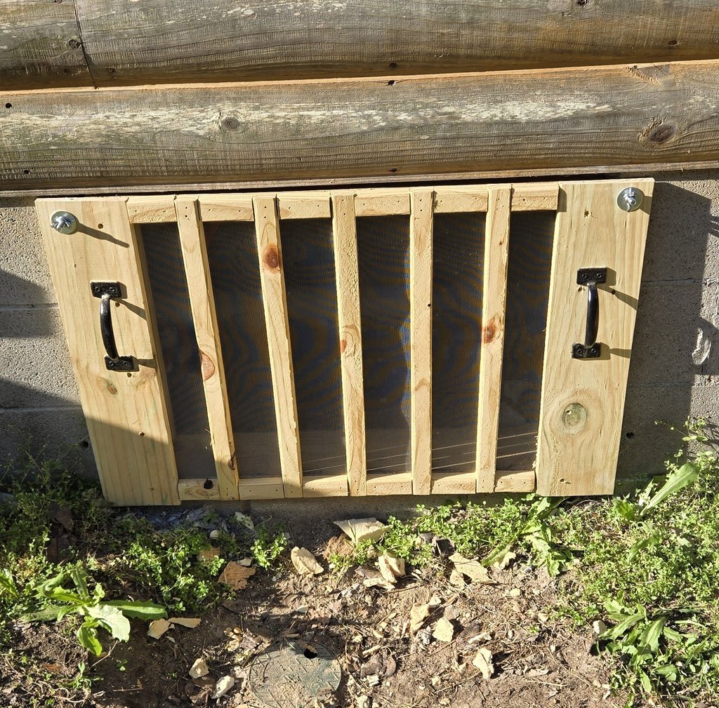 New handmade crawlspace door
