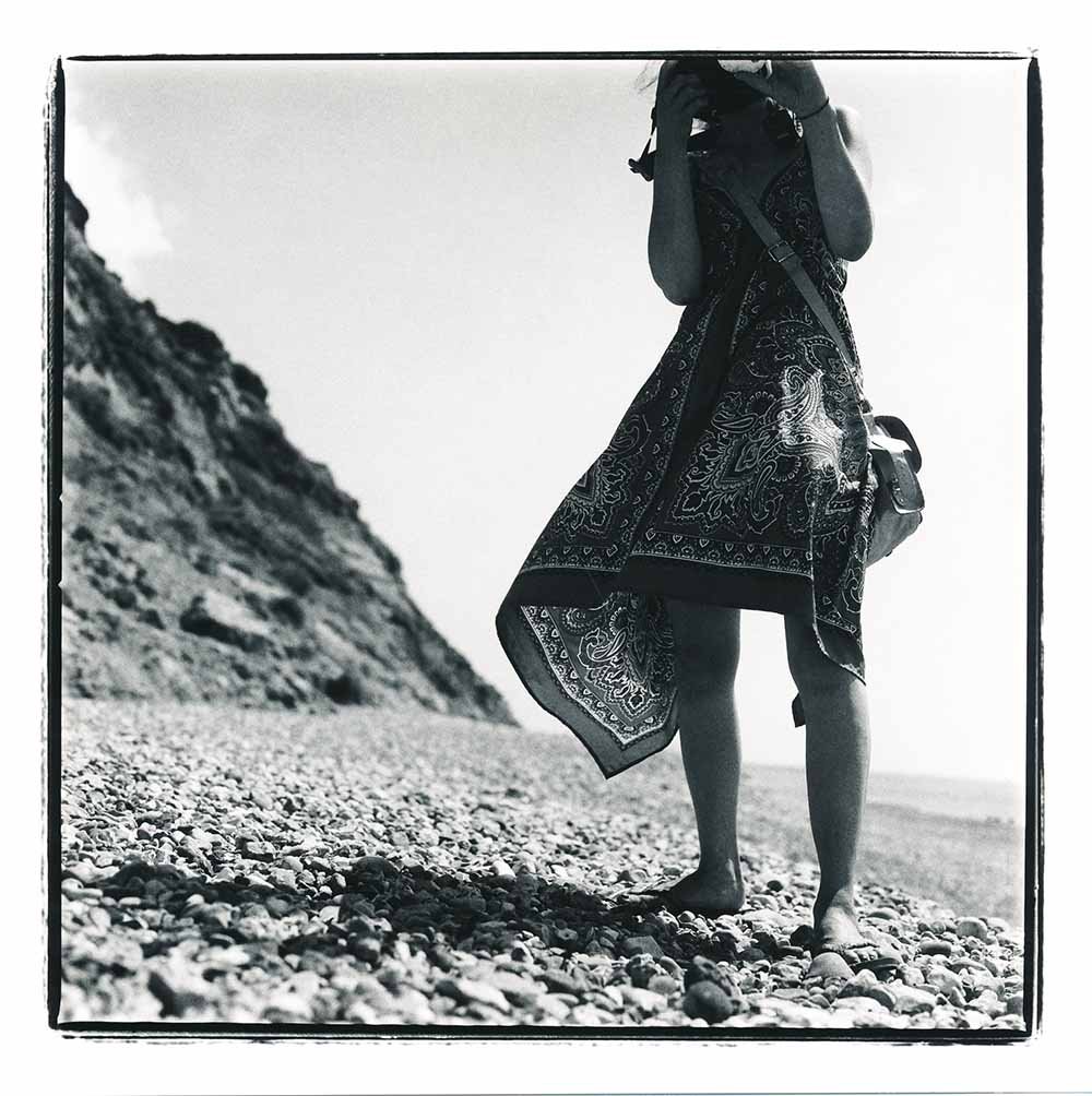 Portrait of a woman on the beach, an analogue black and white picture. Creator: Slawek Dejneka