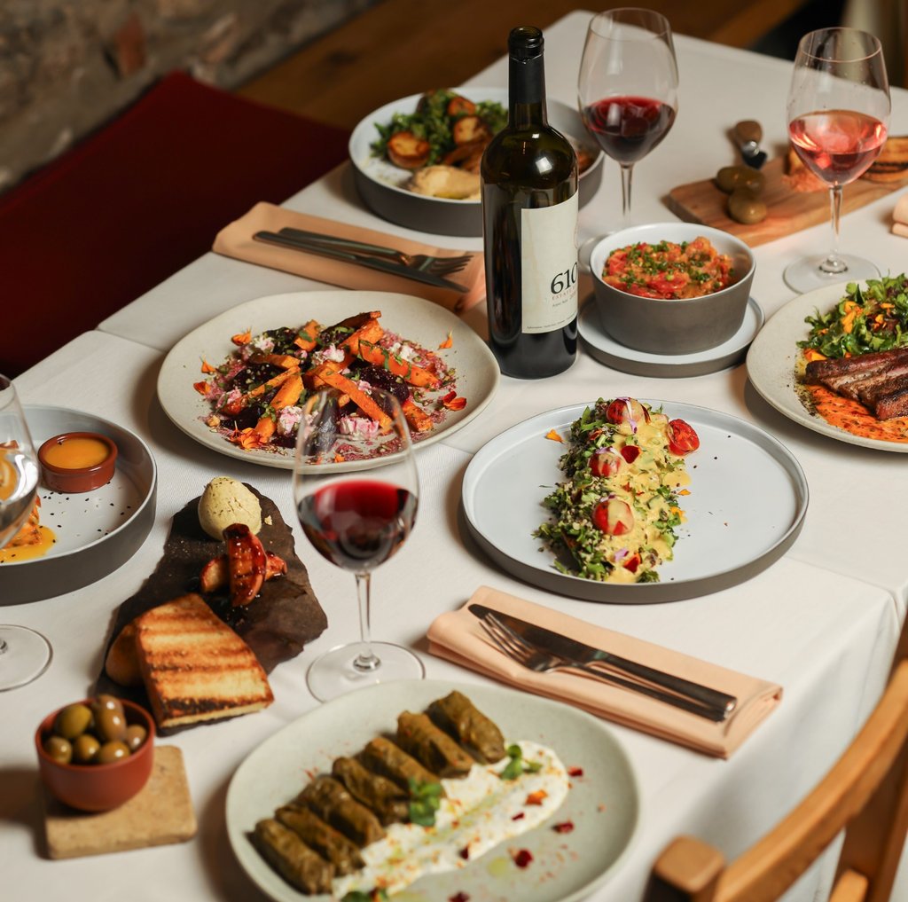 Gourmet New Armenian Cuisine dinner spread.