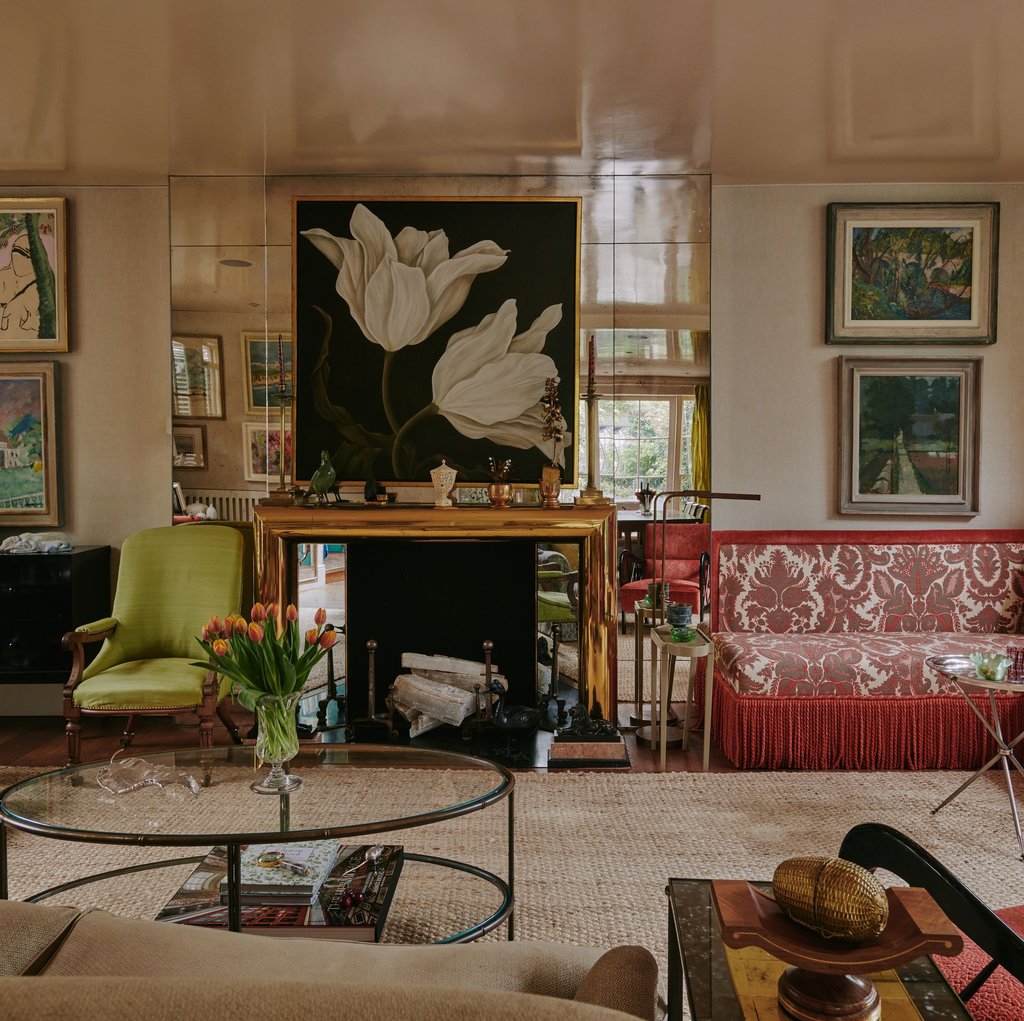 a living room with a couch and a table Nour Nagy Designs London interior Design