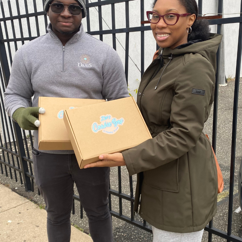 beautiful black woman smiling with homeless man