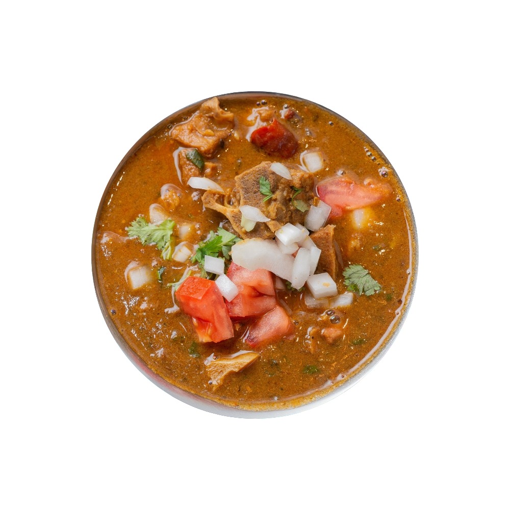 Close-up of gongura mutton with tender meat pieces in thick gravy