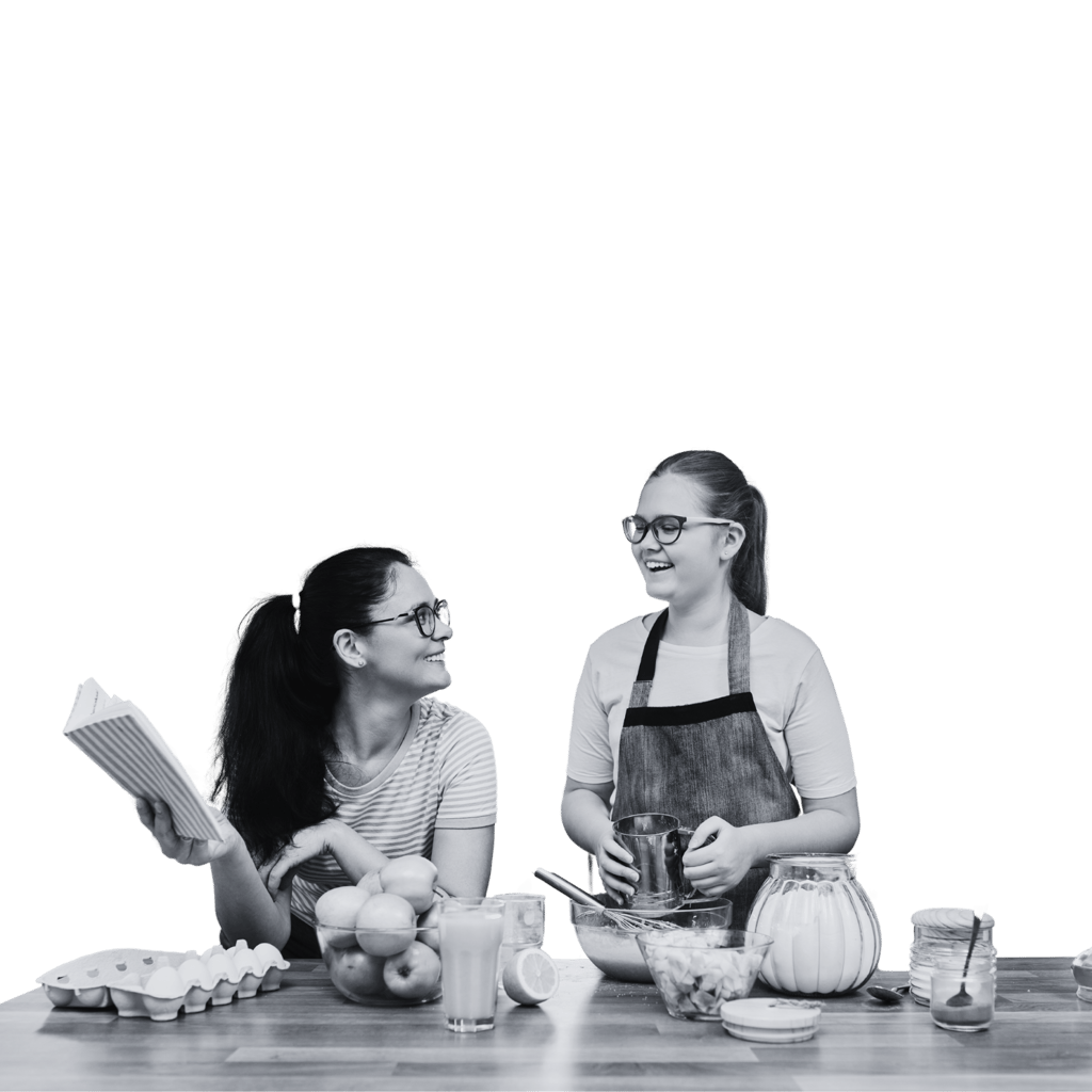 Two young people cooking in the kitchen