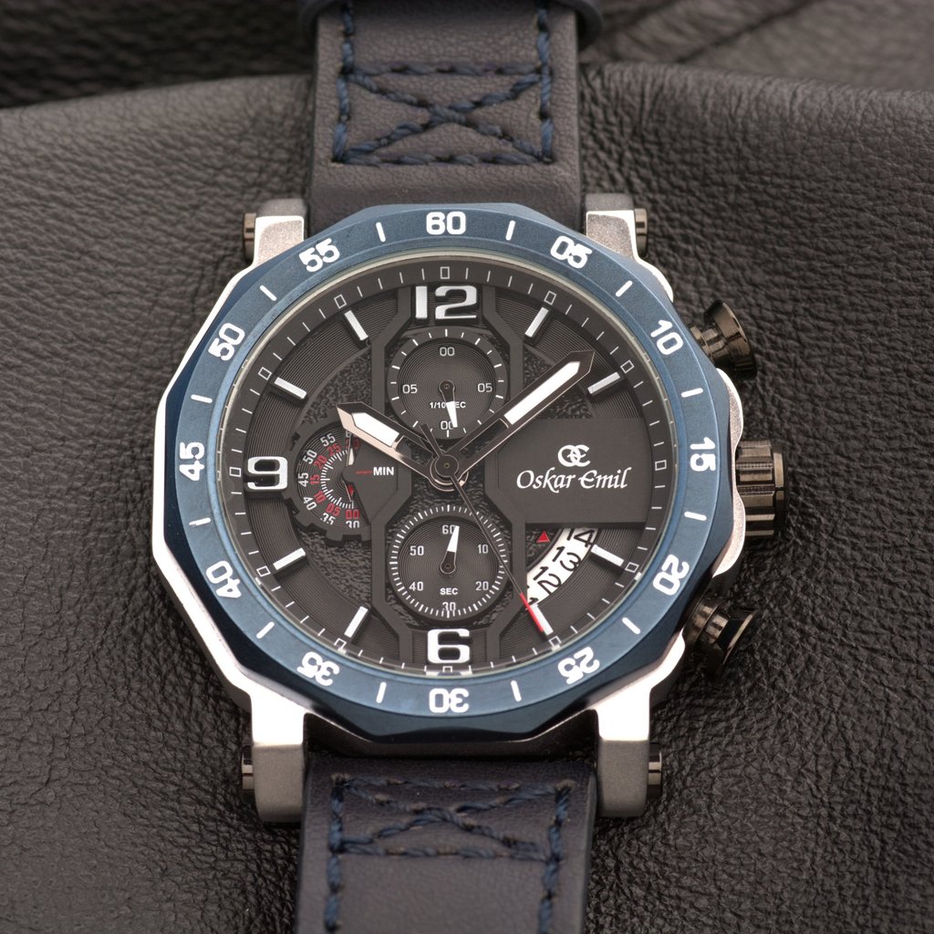 Watch photography image of the face of a watch in close up on a leather background.