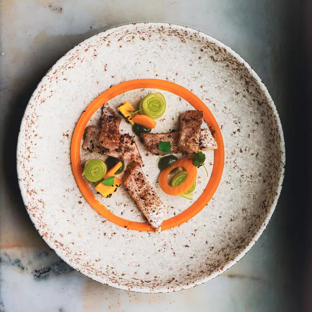 Xagis gerecht met kleurrijke smaken en verfijnde presentatie.