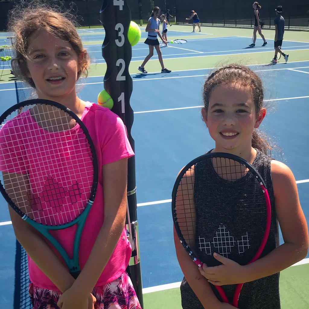 Junior tennis players enjoying league play in Panama City Beach, FL.  