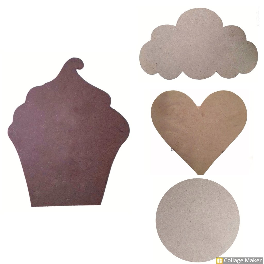 a cupcake cut out of cardboard with a heart shaped cookie