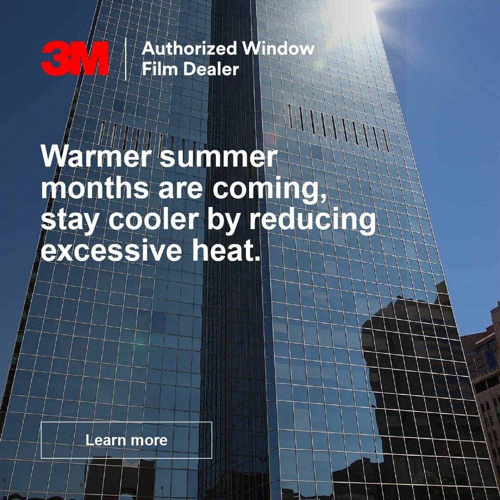 a tall building with a large glass window