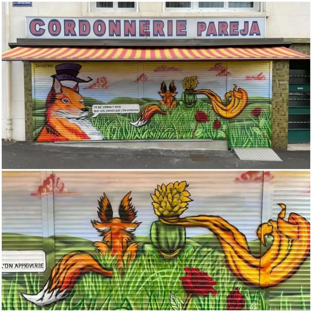 un graffiti qui représente un renard avec le petit prince de dos