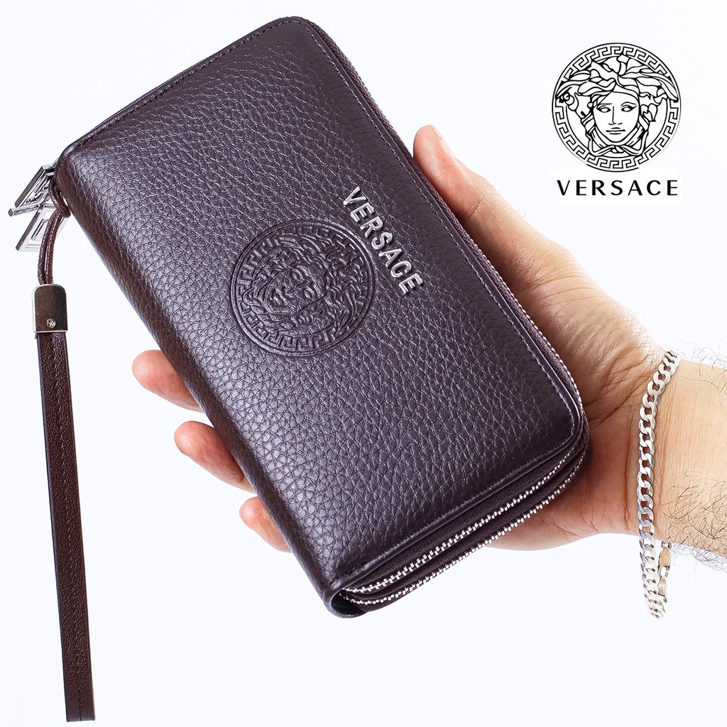 Photo of dark brown textured leather Versace men's wallet with zipper. Luxury fashion KSA.