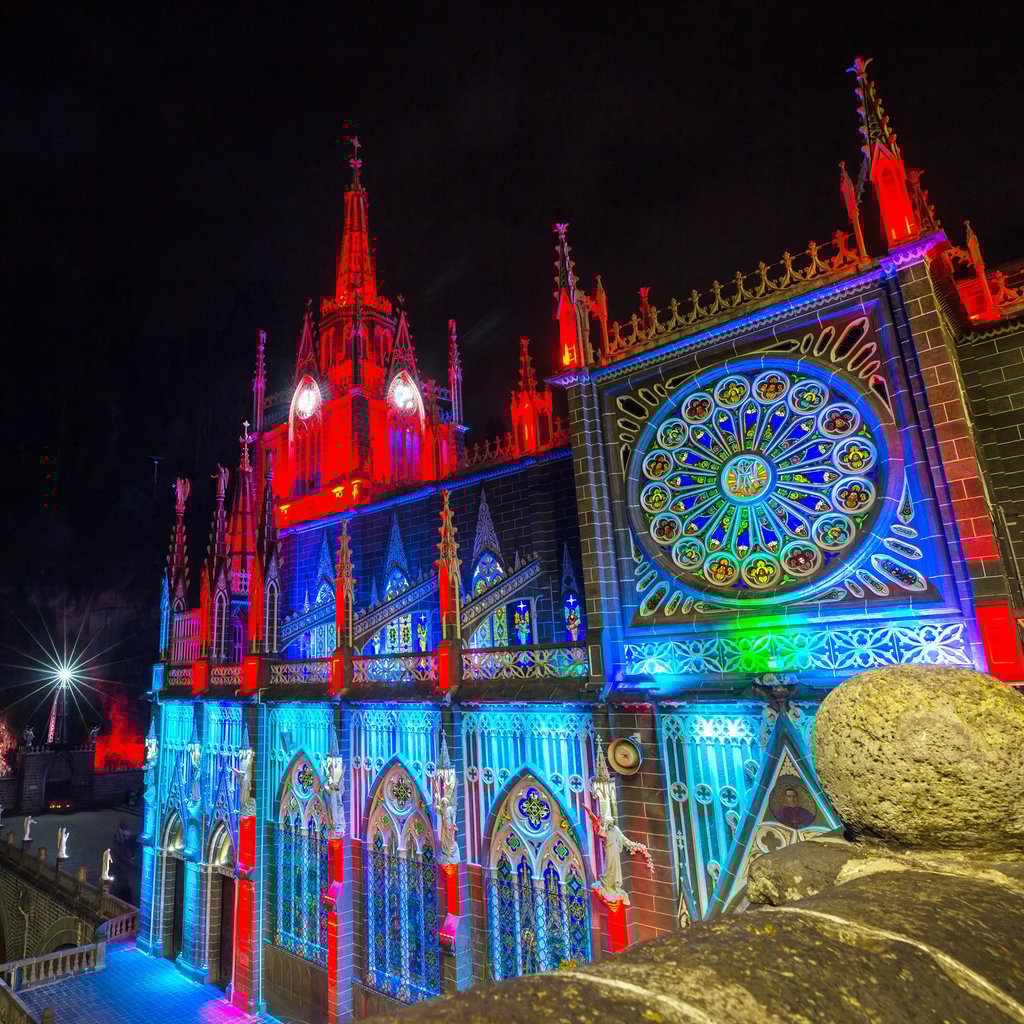 a large building with a projection mapping on it