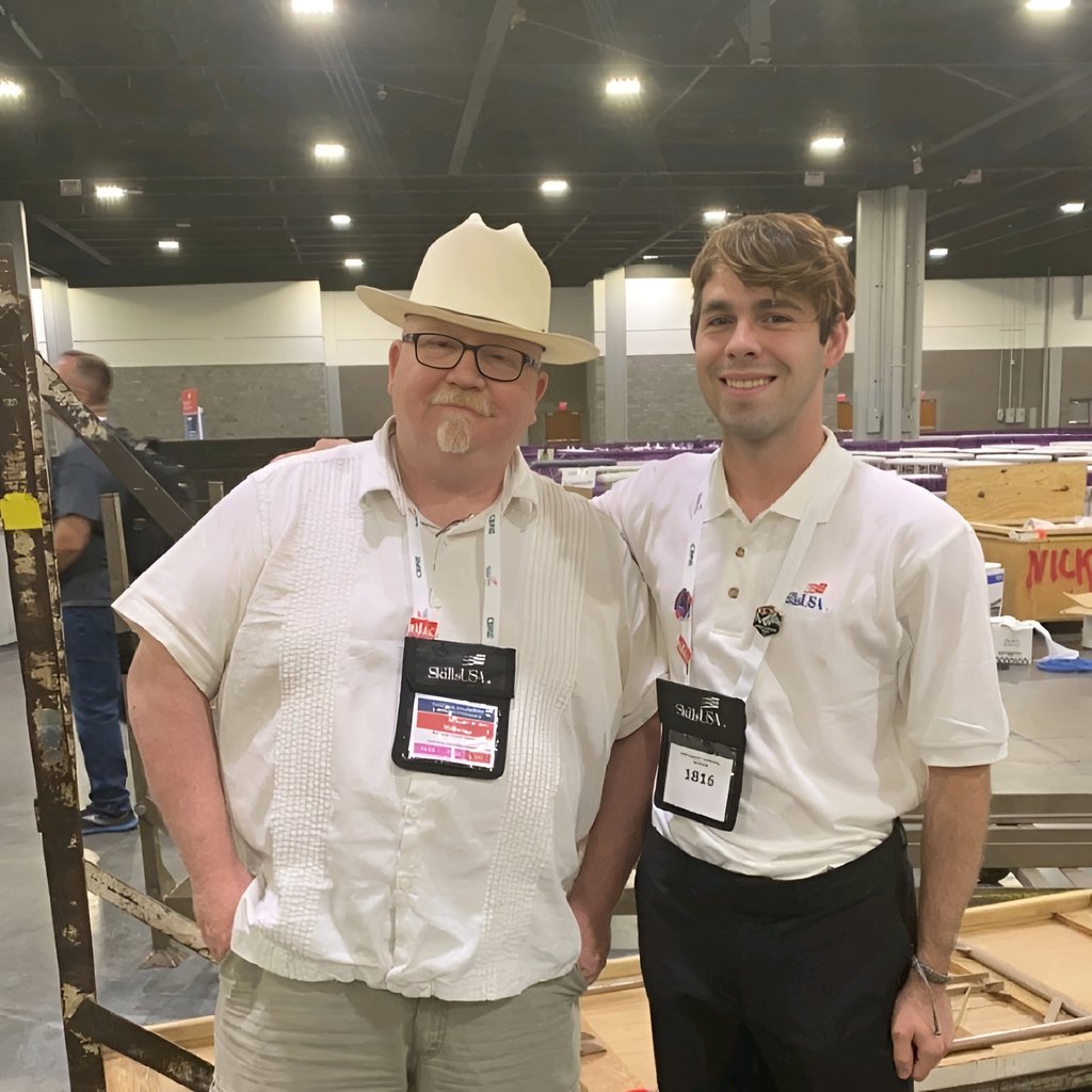 Ashton Geer standing next to Mike Myers the CompTIA Course Writer