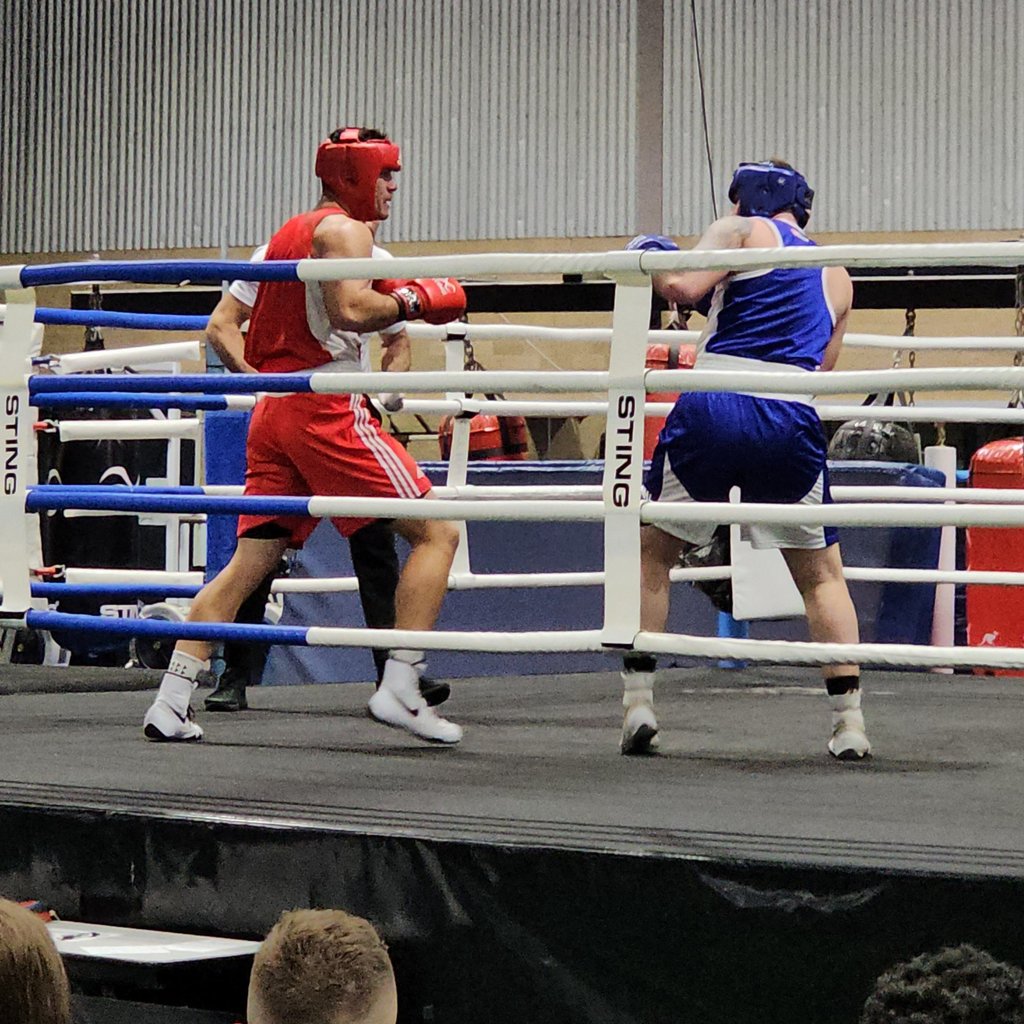 Athletes in a ring during a bout.