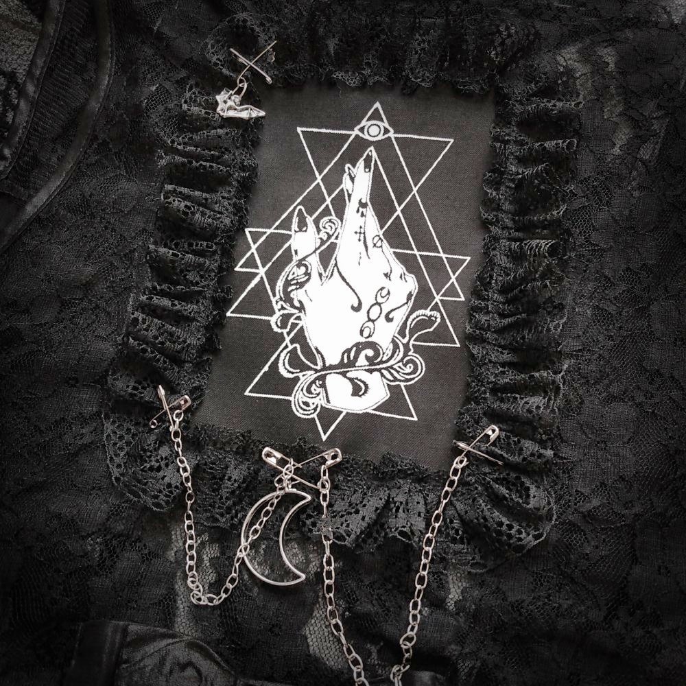elegant and magical witch hand patch used as a back patch