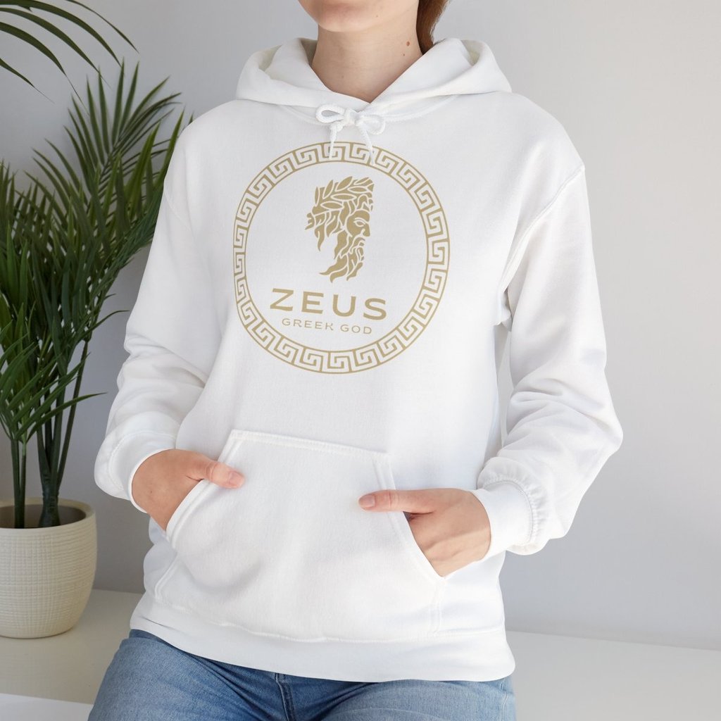 a woman wearing a white hoodie with a gold logo on it