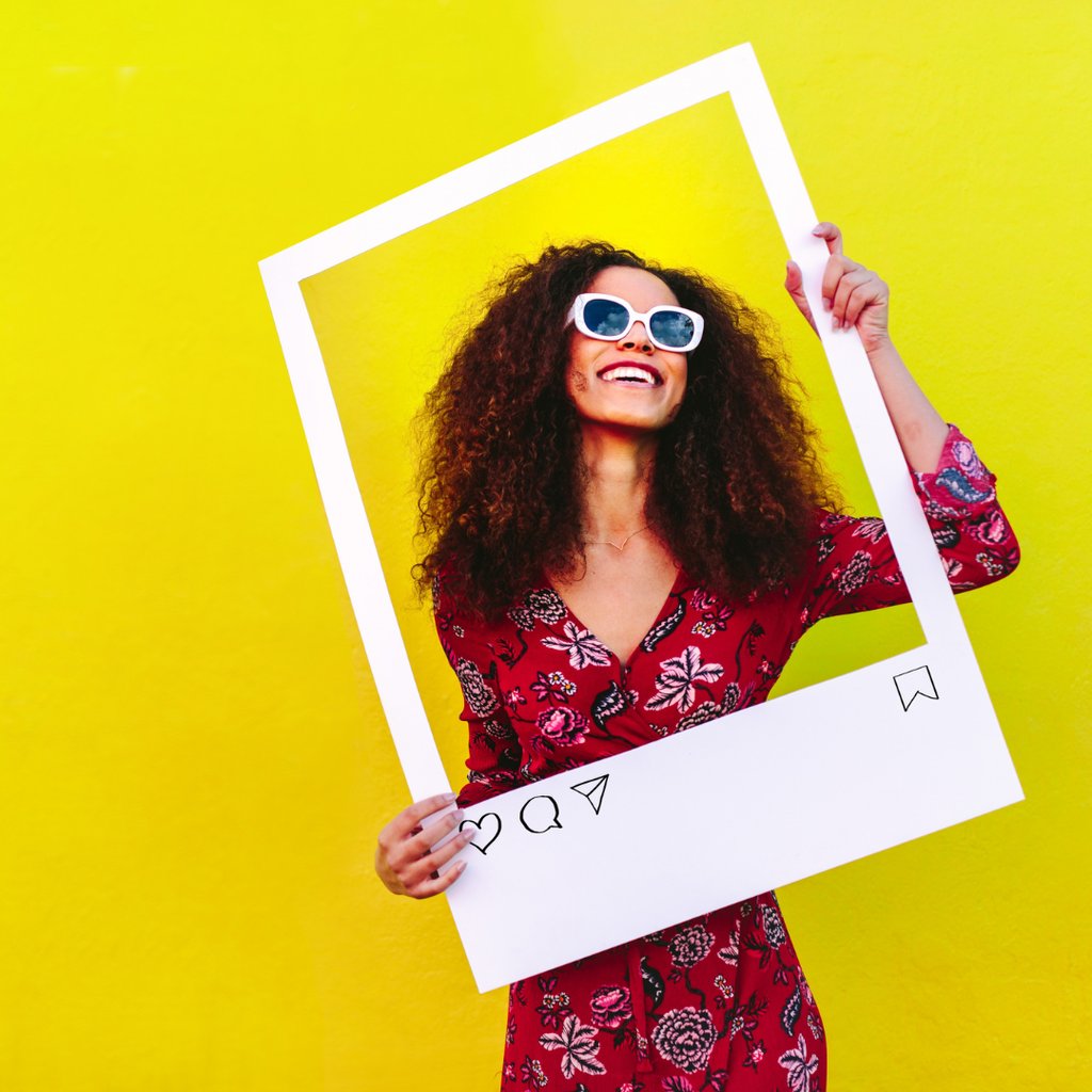 Woman in fashionable eyewear inside a social media post