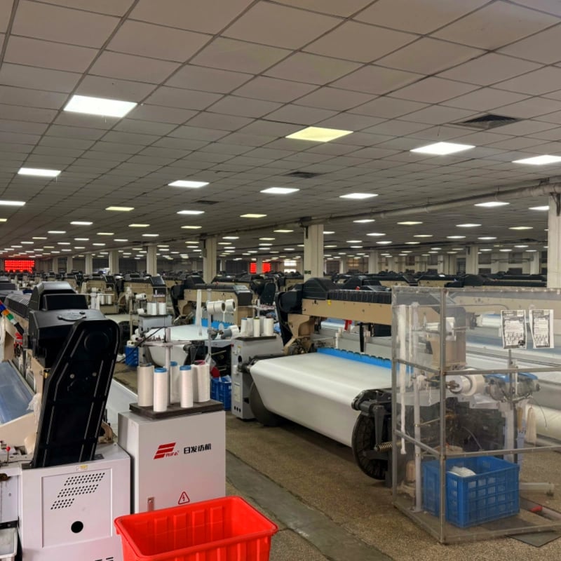 textile factory with advanced weaving machines for large scale fabric production