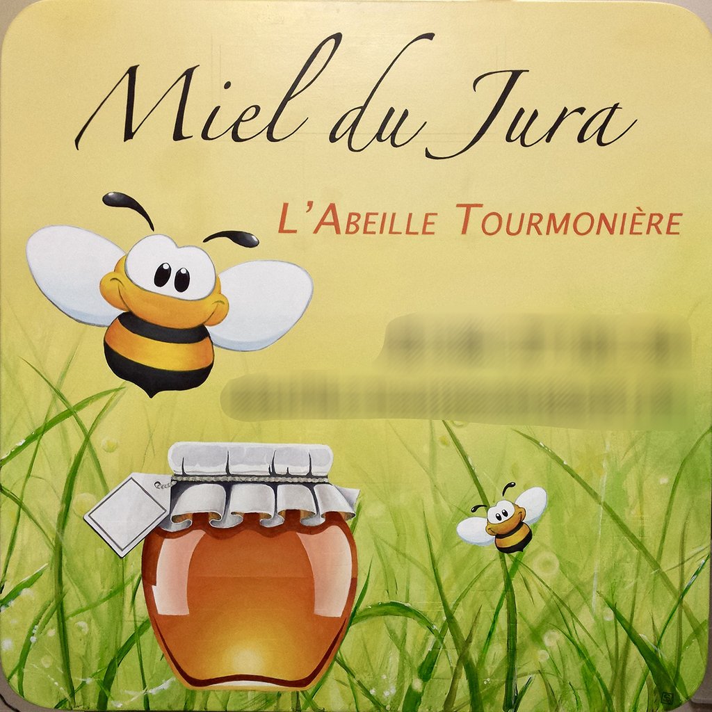 Panneau de publicité peint pour un apiculteur, Jura. abeilles, végétation, miel.