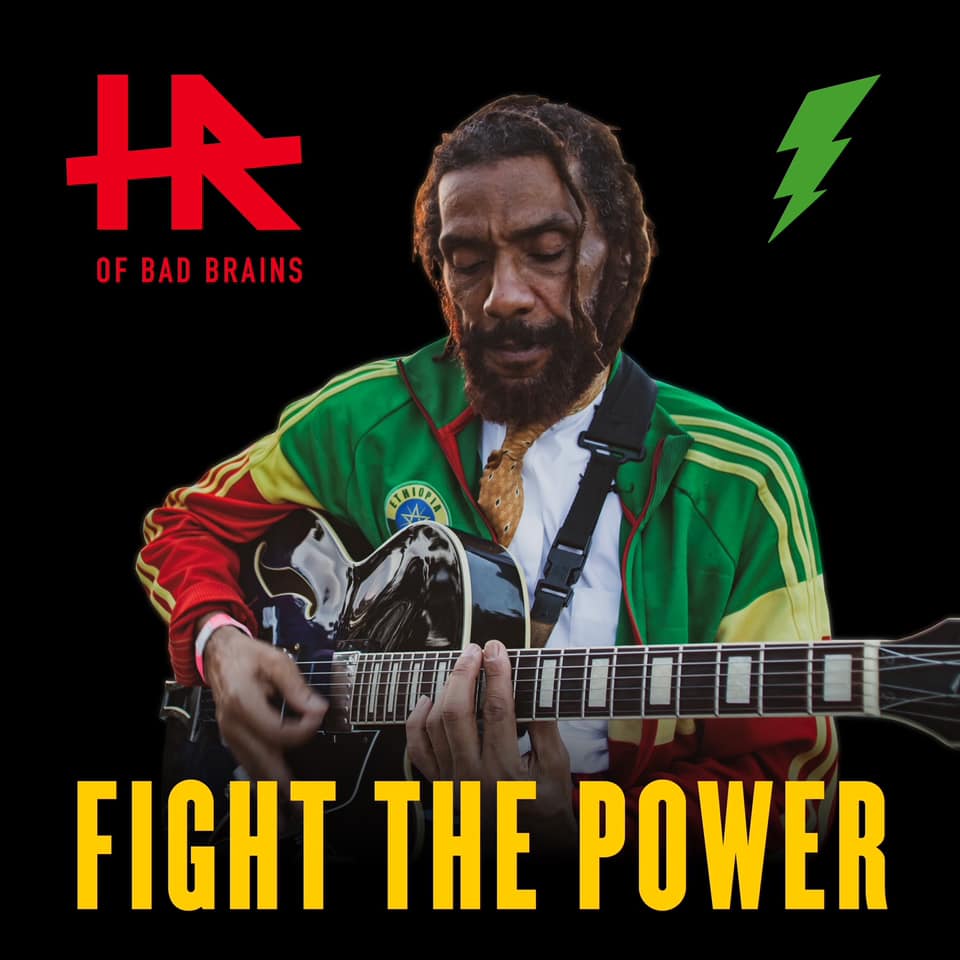 Dub Reggae band member HR of Bad Brains playing guitar at an event booked by J Phoenix Booking Agent